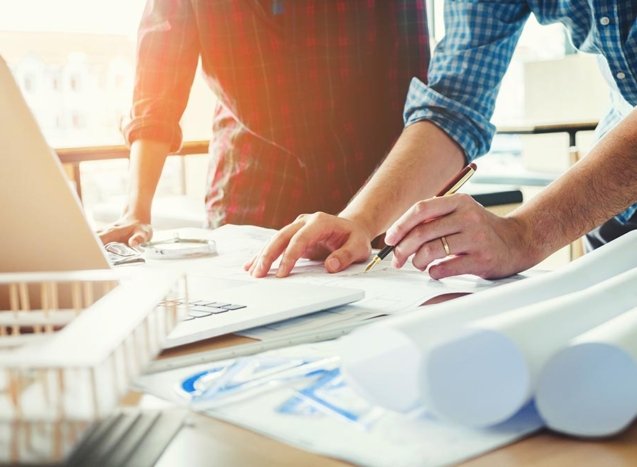 Engineer meeting for architectural project and working with partner engineering on workplace